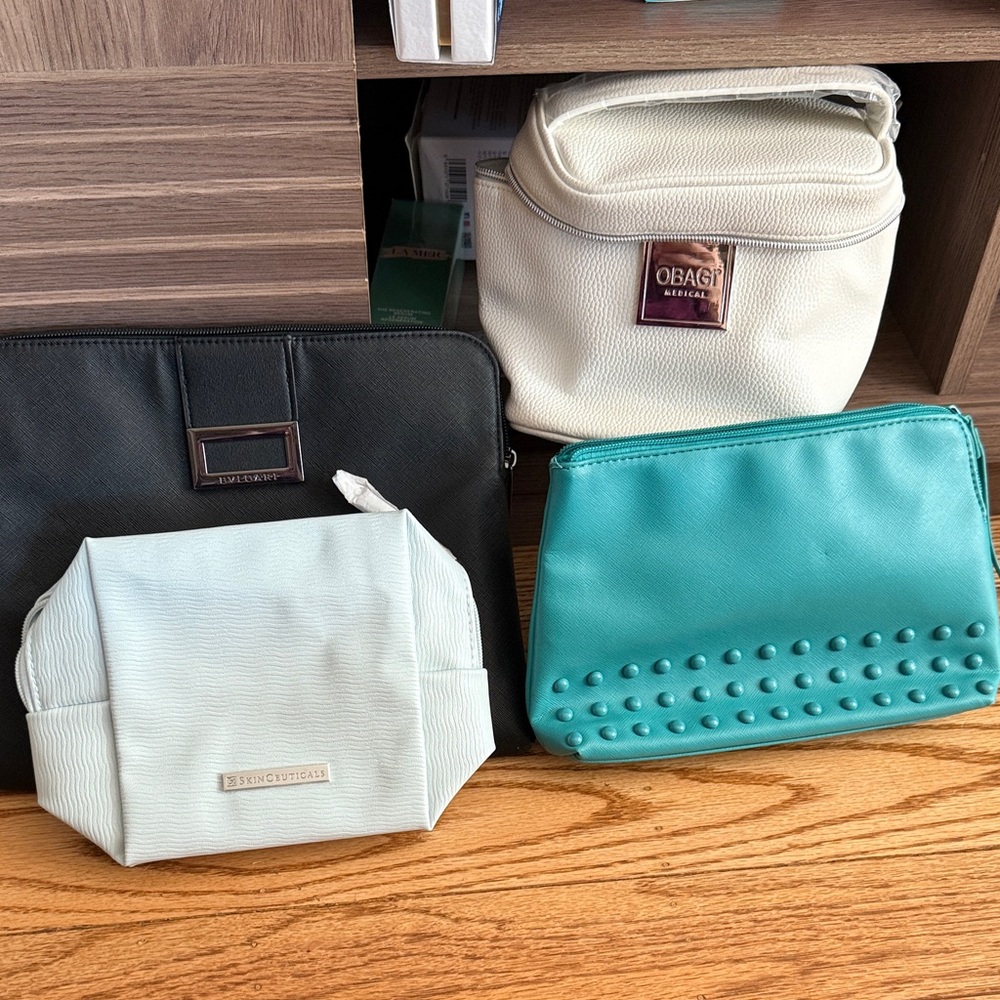 Cosmetics Pouches: Obagi, SkinCeuticals, Neiman Marcus wristlet, Bulgari